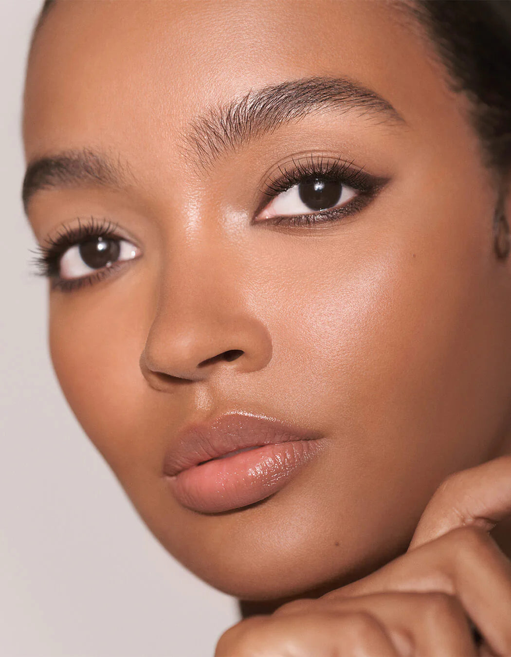 pplying RevitaLash Cosmetics Defining Liner Eyeliner along the upper lash line.