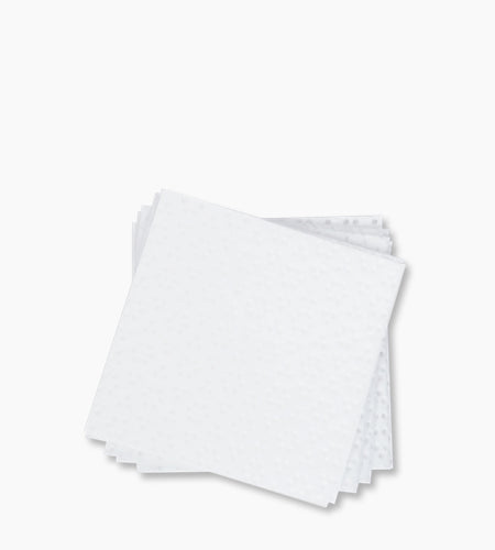 Thin absorbent Xtreme Lashes Multipurpose Wipes for adhesive bottle care.