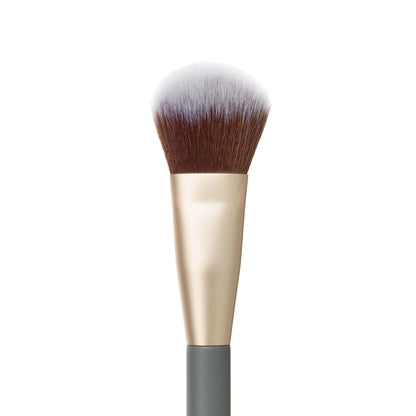 Close-up of Jane Iredale Cheek Brush featuring fluffy blending fibers.