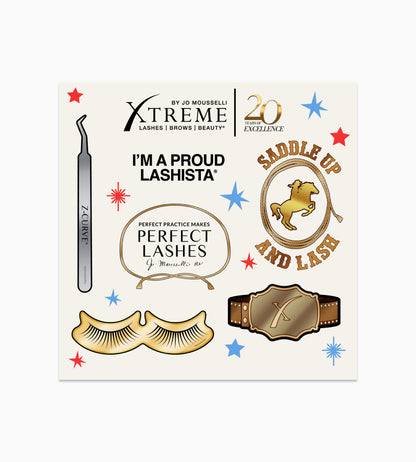 Xtreme Lashes anniversary stickers applied to a laptop and water bottle.